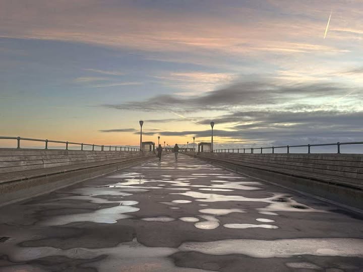 Deal Pier below a hazy morning sky